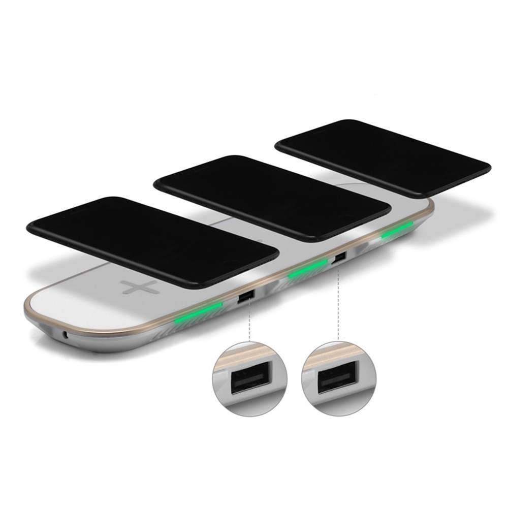 Universal 3--1 Qi Wireless Charger with three charging pads and USB ports for multiple devices.