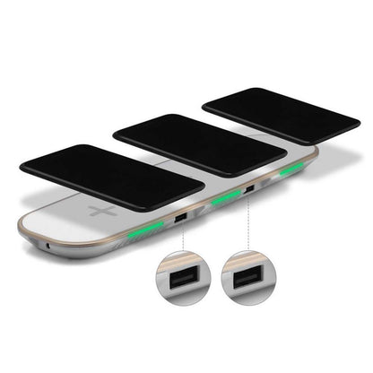 Universal 3--1 Qi Wireless Charger with three charging pads and USB ports for multiple devices.